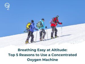 Three hikers in winter gear trek up a snowy slope under a clear blue sky, highlighting the benefits of concentrated oxygen machines.